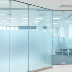 Showcasing movable glass partitions that enhance modern office spaces with elegance and functionality.